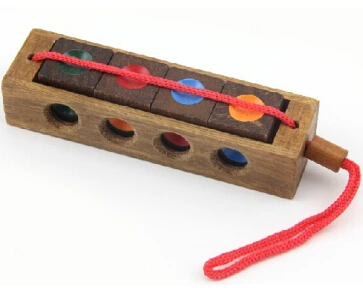 Casse tête 4 pièces Les 4 couleurs folles en bois avec cubes colorés
