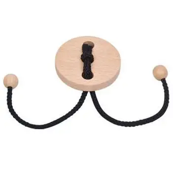 Casse tête rond en bois clair avec cordelette noire et deux billes